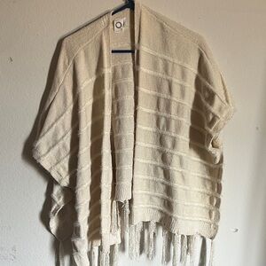 Elegant Cream Cape with Fringe